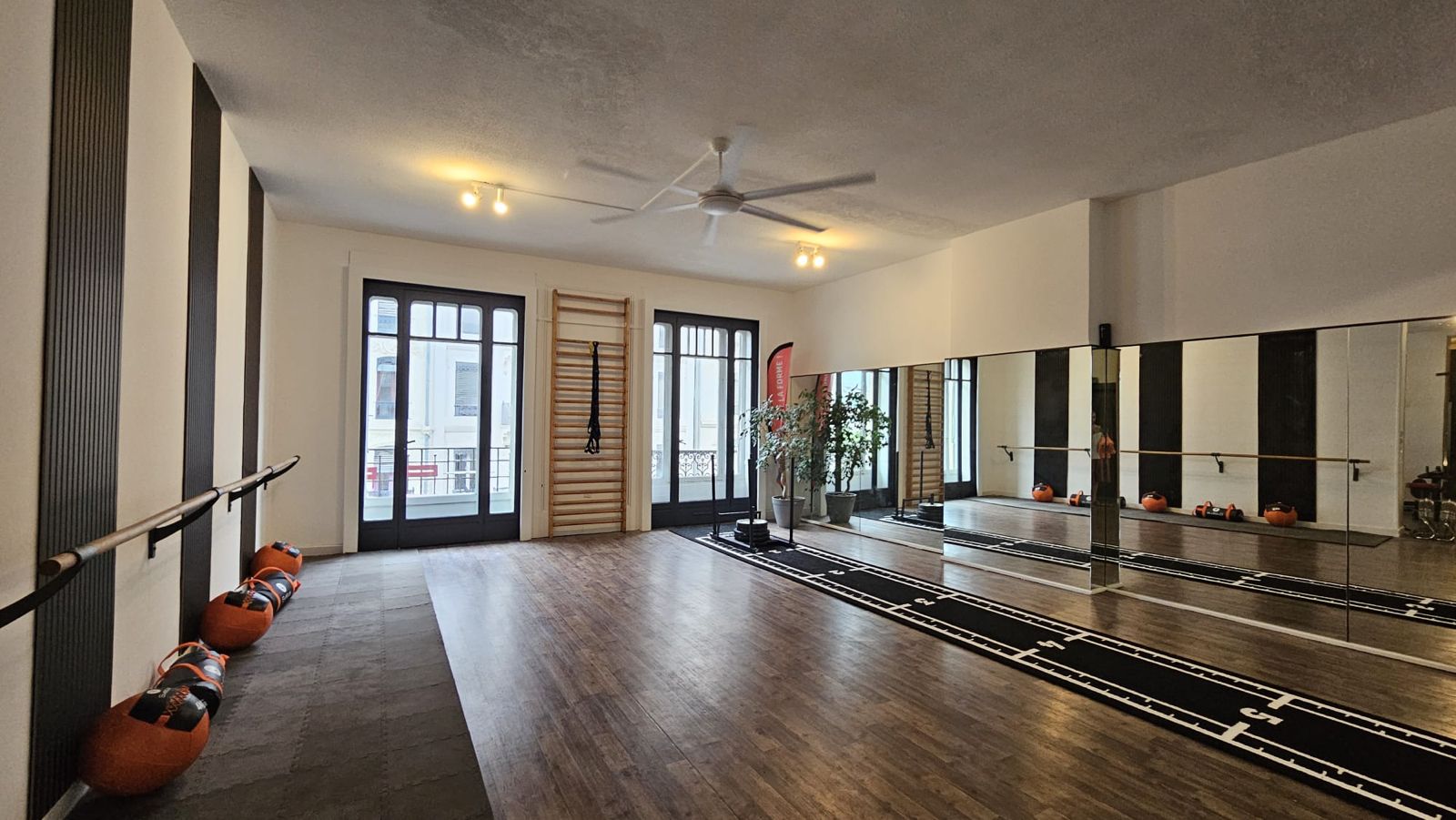 Grand plateau d'entraînement de Bellecour Training Studio, studio de coaching premium à 50 m de la Place Bellecour, 87 rue de la République, Lyon 2